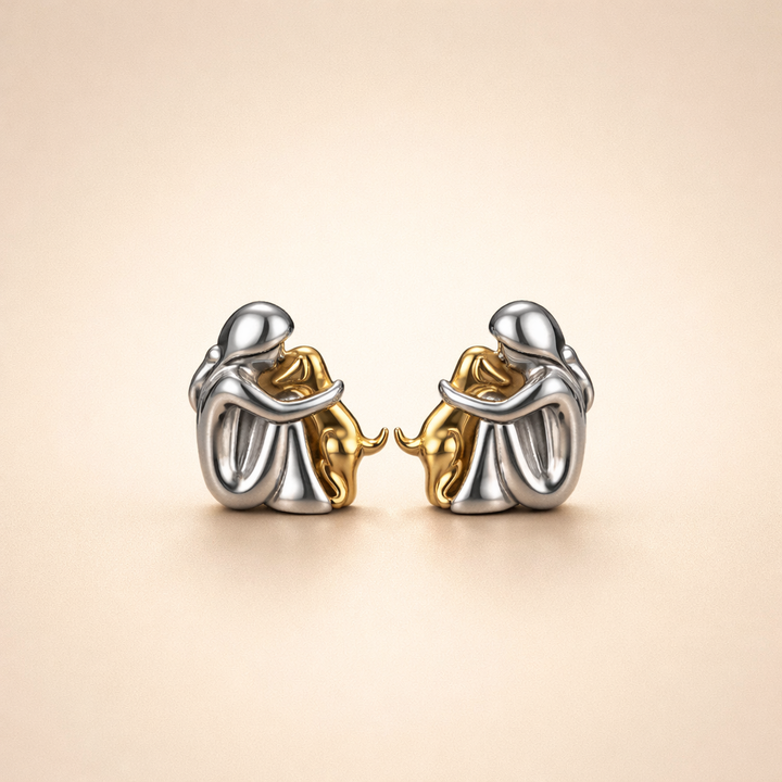 Minimalist silver earrings with subtle round shapes
