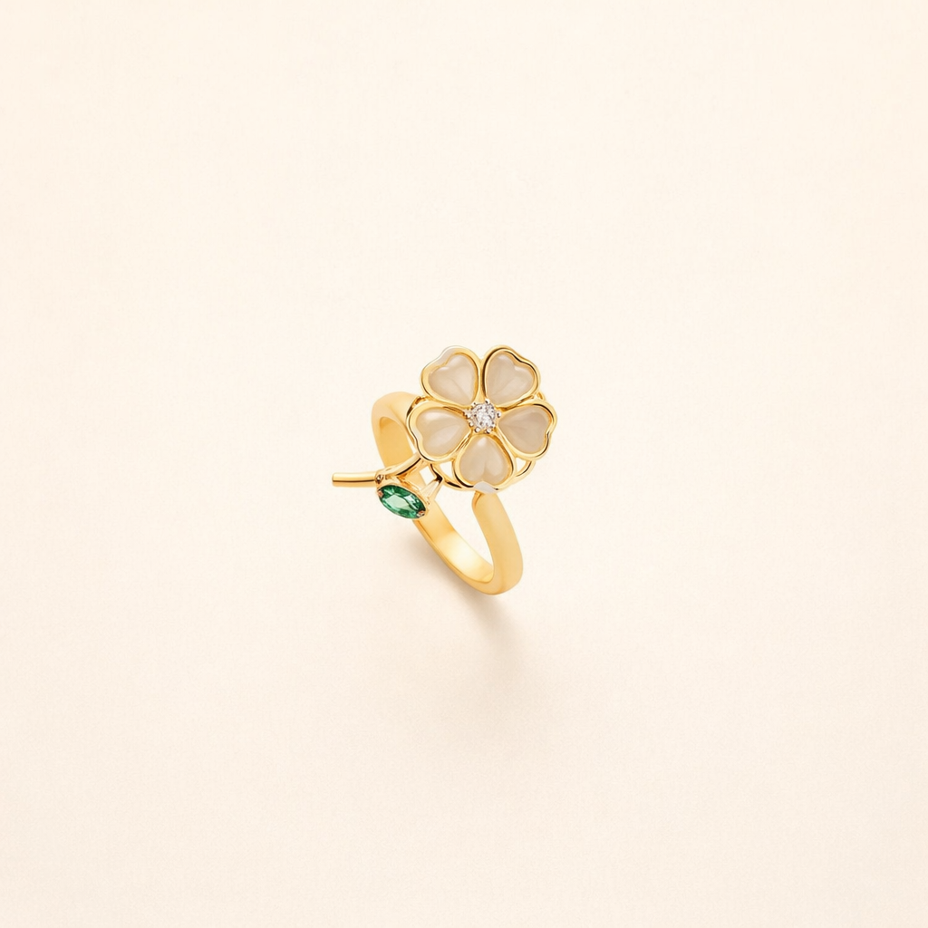 Elegant gold ring with rotating leaves