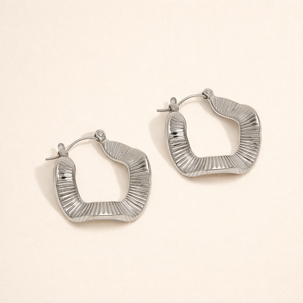 Elegant silver hoops with subtle waves