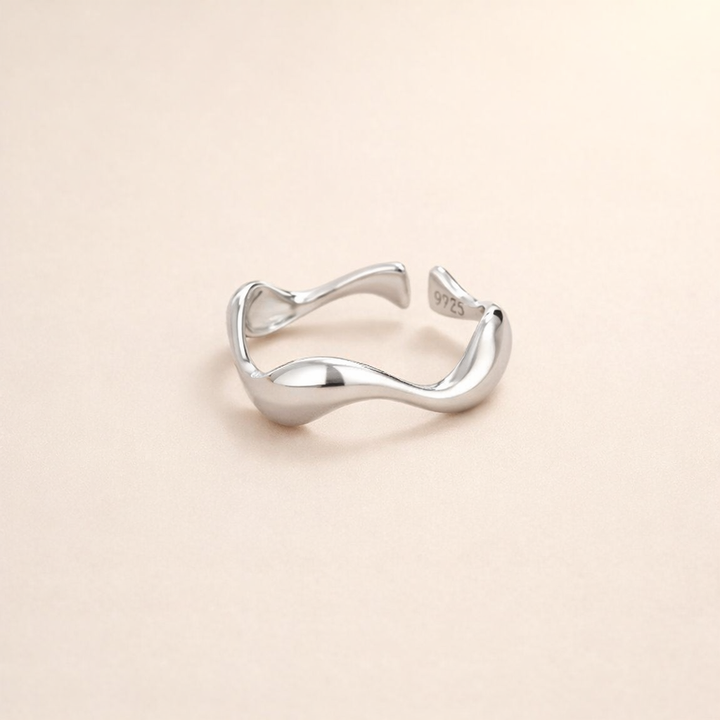 Elegant silver wave ring with refined lines
