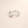 Elegant silver wave ring with refined lines