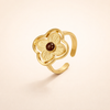 Silver ring with tiger's eye and delicate flower motifs