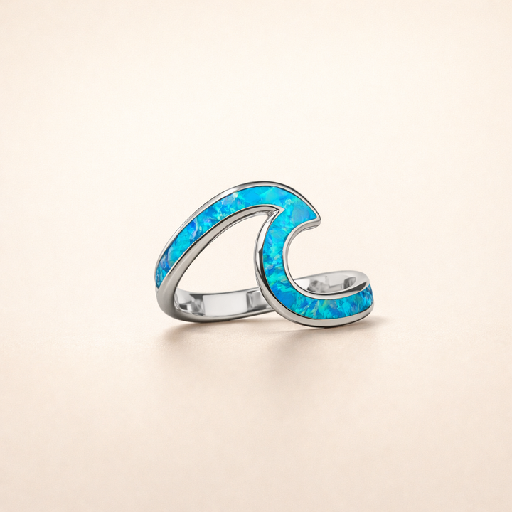 Silver ring with opal and wavy shapes