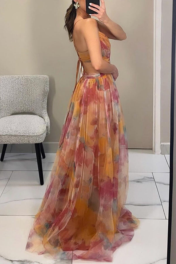 Women's maxi dress with thin straps and V-neck in a multicolour print