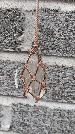 Necklace with interchangeable crystal stone for radiant style and harmony.