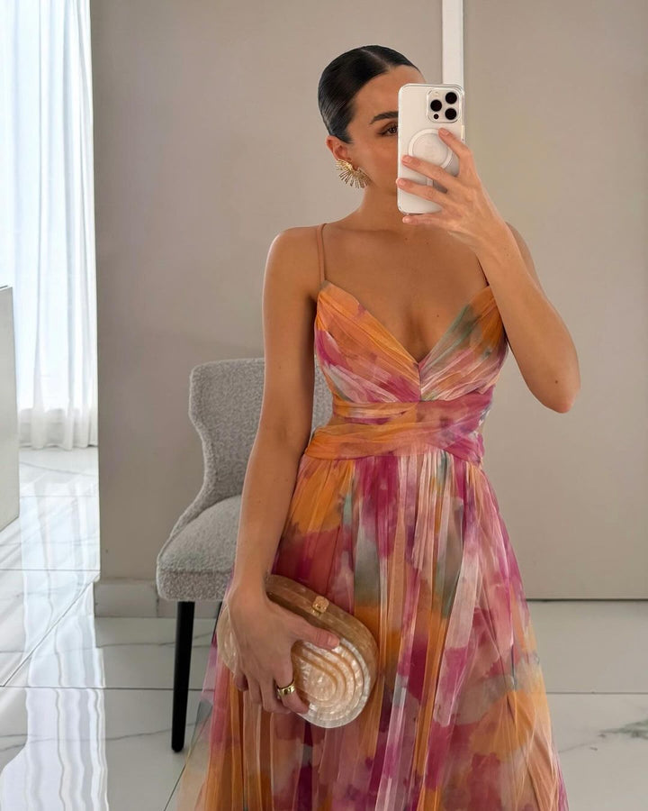 Women's maxi dress with thin straps and V-neck in a multicolour print