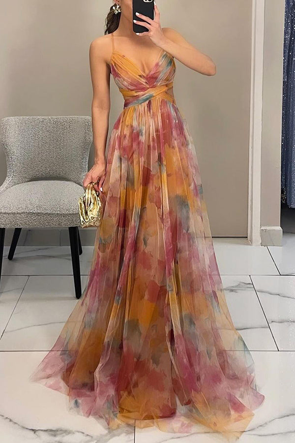 Women's maxi dress with thin straps and V-neck in a multicolour print