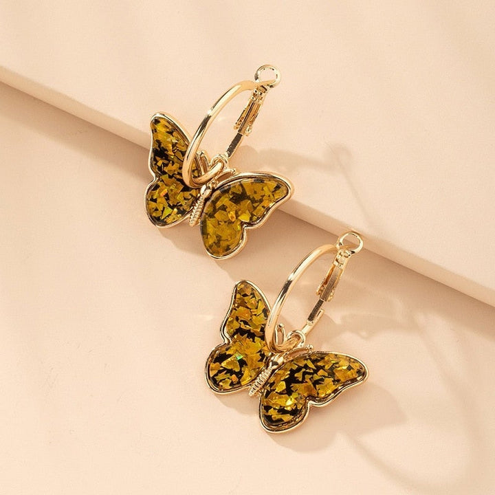 Butterfly earrings with colourful details.