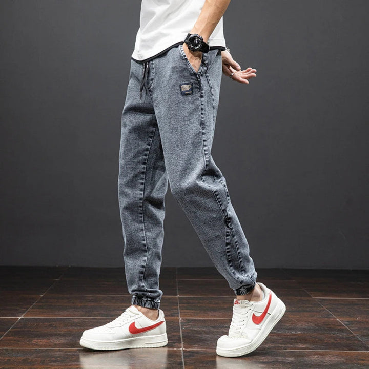 https://cdn.shopify.com/s/files/1/0798/5535/4068/files/Men_s_Stretch_Denim_Jogger_Pants_-_Liam_1.jpg?v=1769093730