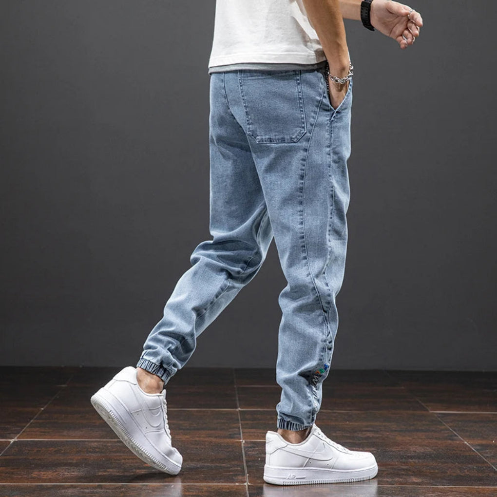 https://cdn.shopify.com/s/files/1/0798/5535/4068/files/Men_s_Stretch_Denim_Jogger_Pants_-_Liam_3.jpg?v=1769093730