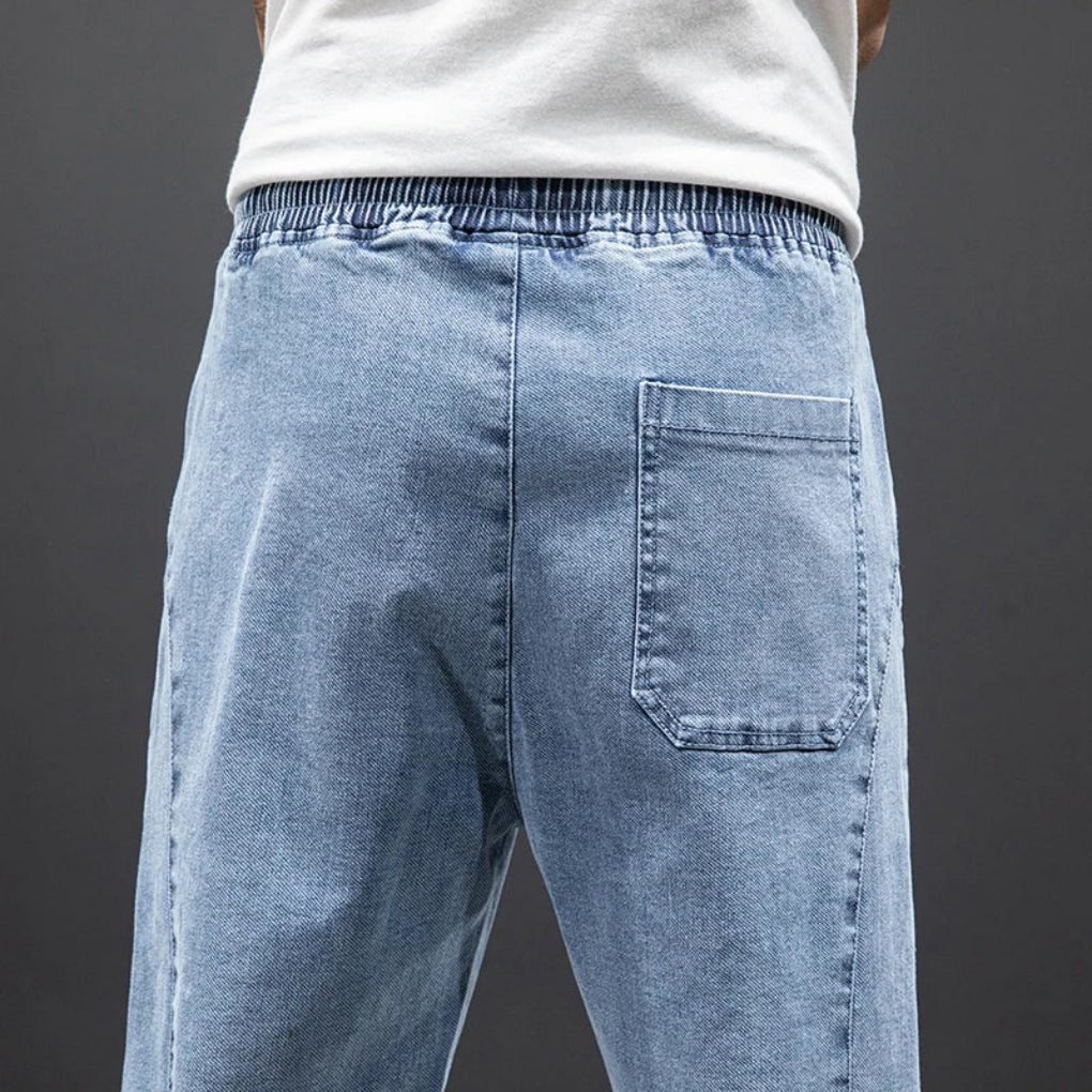 https://cdn.shopify.com/s/files/1/0798/5535/4068/files/Men_s_Stretch_Denim_Jogger_Pants_-_Liam_4.jpg?v=1769093730