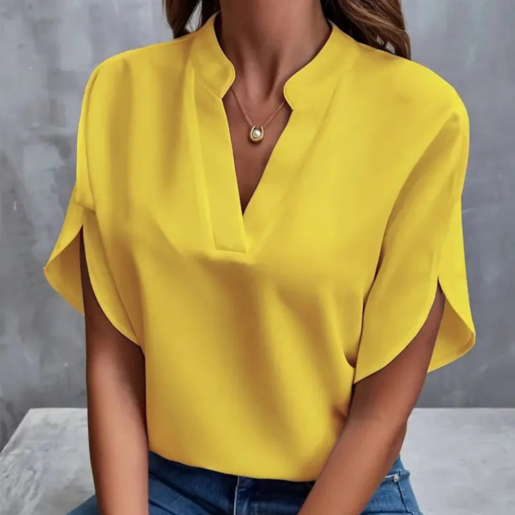 https://cdn.shopify.com/s/files/1/0864/2786/1320/files/Nora___Women_s_Blouse__Elegant__Comfortable___Versatile_White_Top_1.jpg?v=1772447185