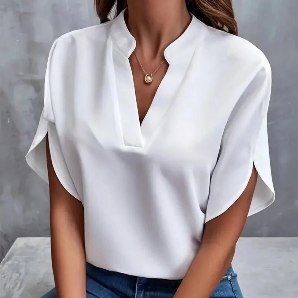 https://cdn.shopify.com/s/files/1/0864/2786/1320/files/Nora___Women_s_Blouse__Elegant__Comfortable___Versatile_White_Top_4.jpg?v=1772447185