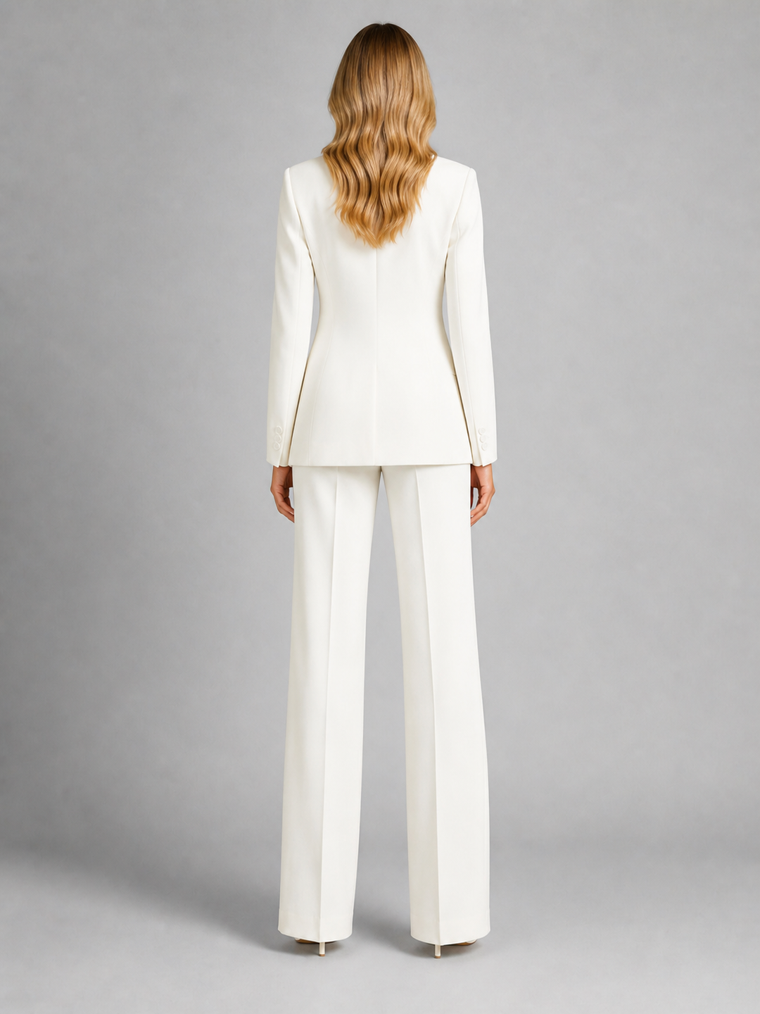 Two-piece women's set: women's blazer with tailored cut and wide-leg trousers