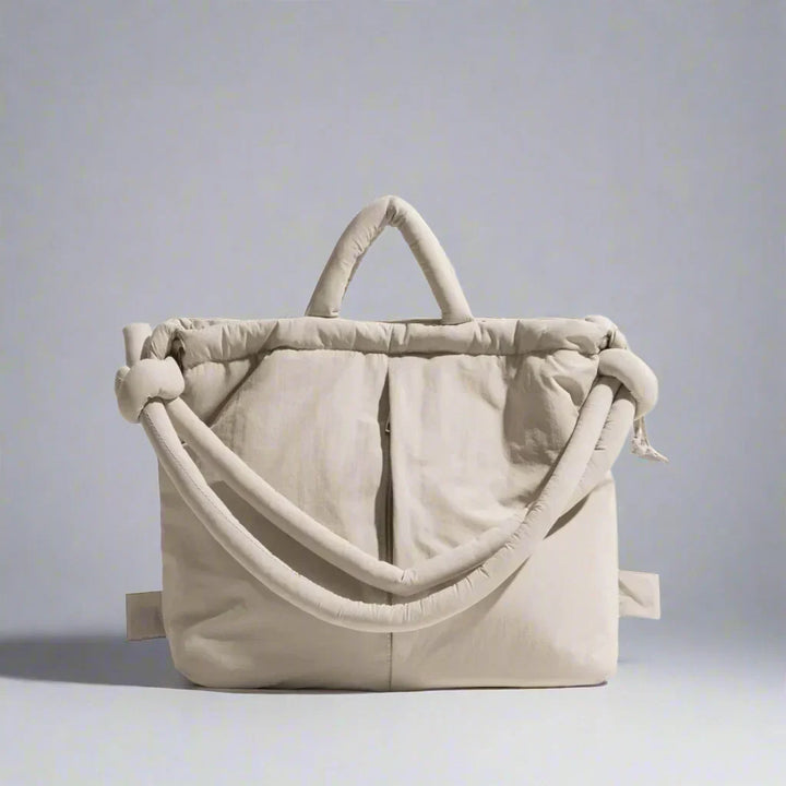 https://cdn.shopify.com/s/files/1/0952/6175/3687/files/adeline-womens-quilted-puffer-handbag-1.webp?v=1777156908