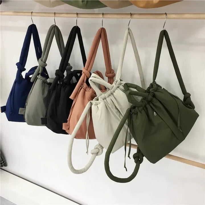 https://cdn.shopify.com/s/files/1/0952/6175/3687/files/adeline-womens-quilted-puffer-handbag-7.webp?v=1777156920