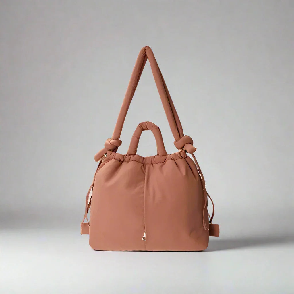 https://cdn.shopify.com/s/files/1/0952/6175/3687/files/adeline-womens-quilted-puffer-handbag-8.webp?v=1777156921