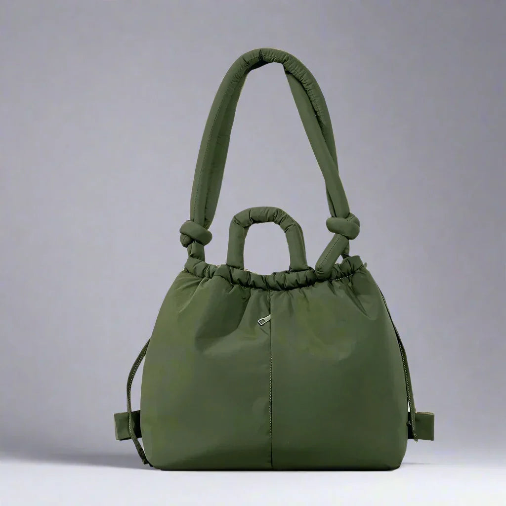 https://cdn.shopify.com/s/files/1/0952/6175/3687/files/adeline-womens-quilted-puffer-handbag-9.webp?v=1777156923