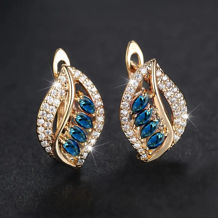 Ethereal gold earrings with delicate cubic zirconia