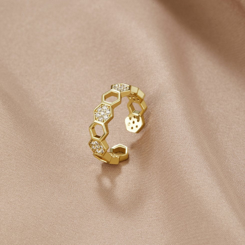 Refined gold ring with sparkling crystals