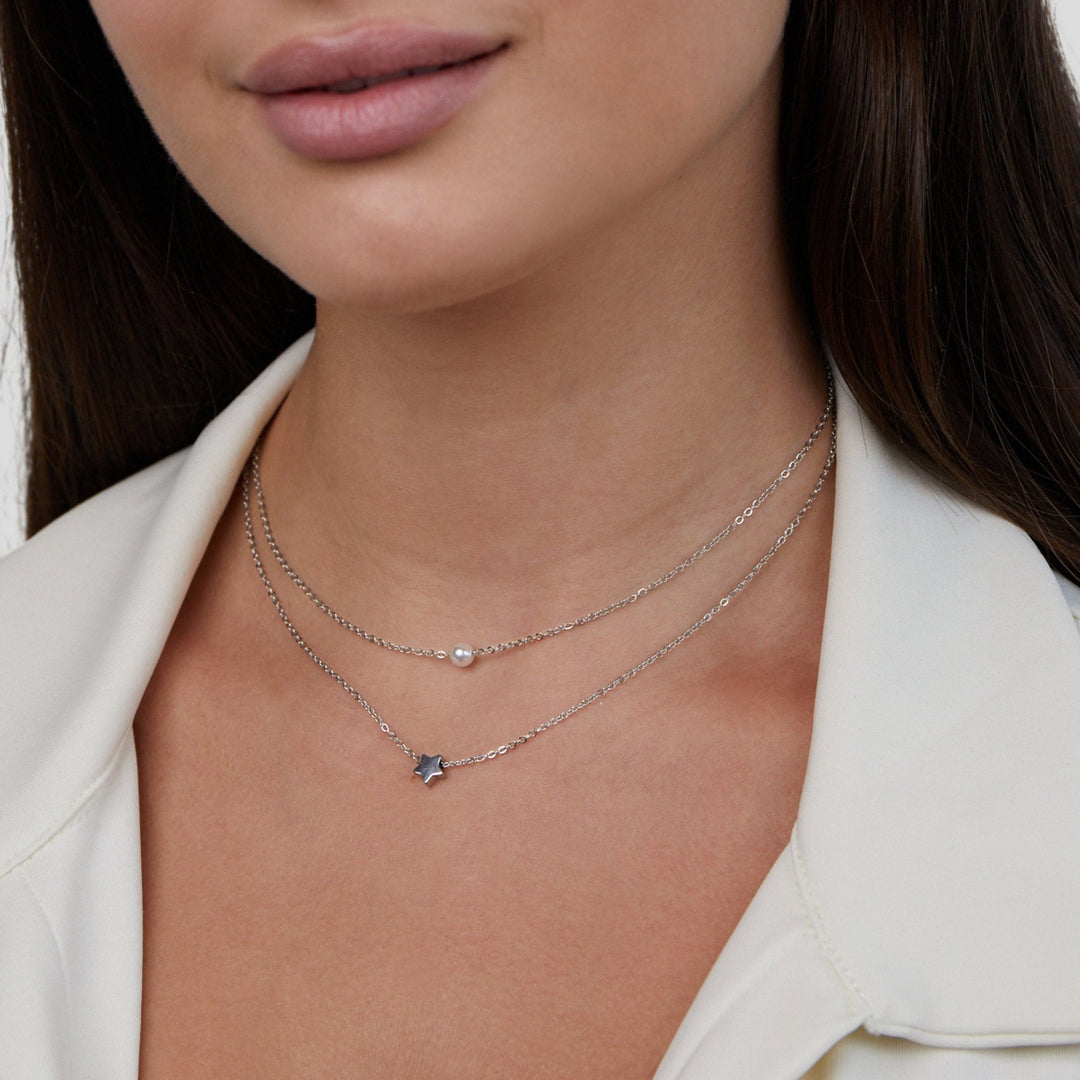 Refined silver necklace with stars and pearls