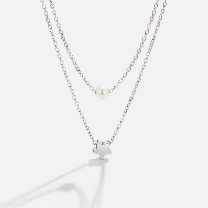 Refined silver necklace with stars and pearls