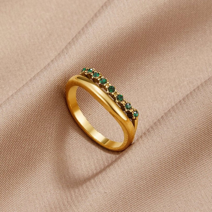 Layered ring in emerald green with refined finish