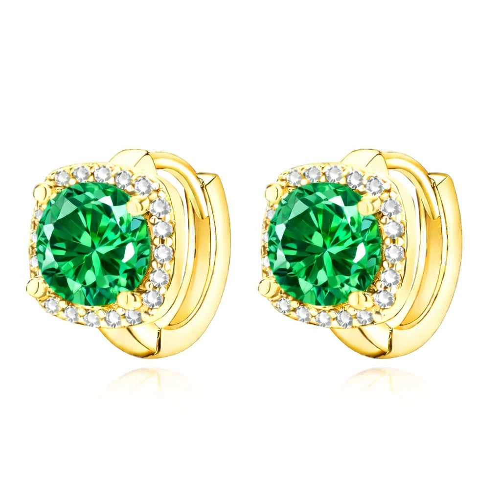 Elegant gold earrings with emerald detail