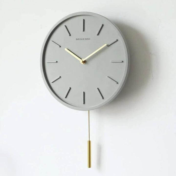 Betonwanduhr mit Metallpendel - Tundra