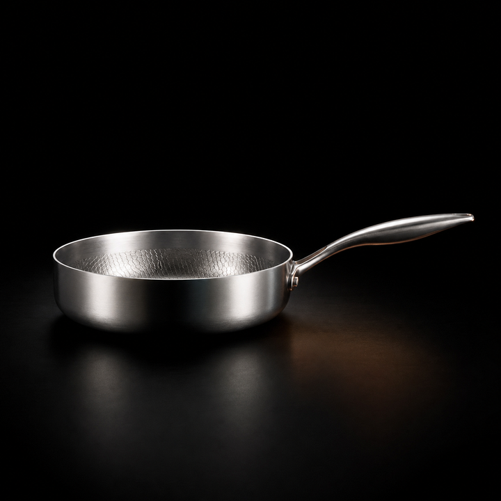 Hammered titanium frying pan with high sides