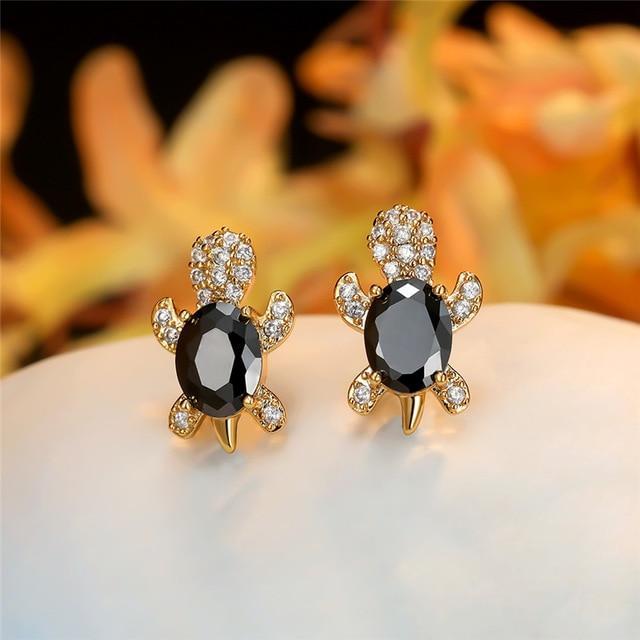 Elegant silver earrings with cubic zirconia and seaweed design