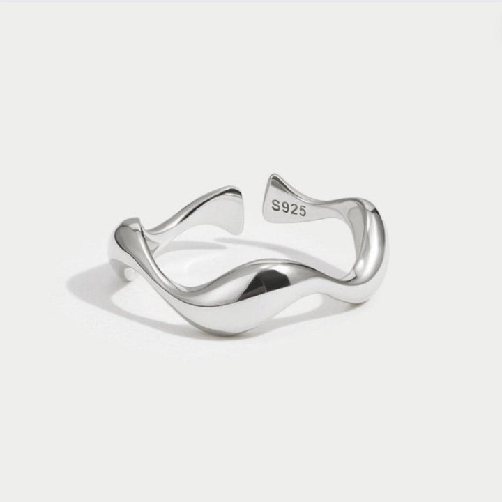 Elegant silver wave ring with refined lines