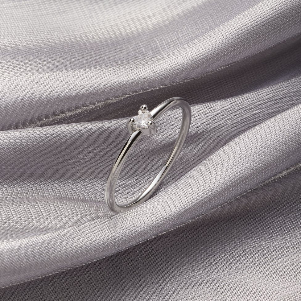 Refined cubic zirconia ring with little heart
