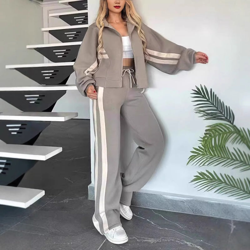 Women's leisure set with zip-up jacket and wide-leg trousers with contrast stripes