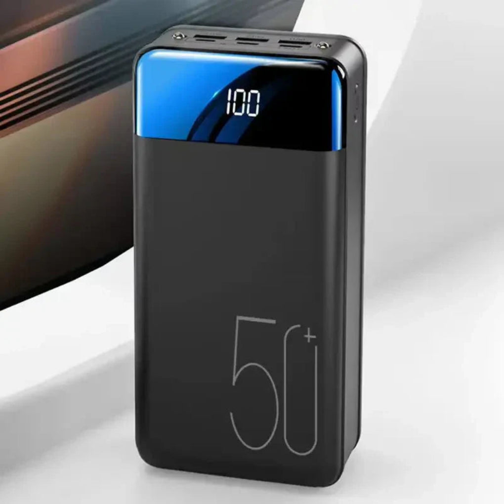 https://cdn.shopify.com/s/files/1/0755/5720/8300/files/ultra-capacity-50k-mah-power-bank-with-versatile-use-shown-in-sleek-design-and-compact-size-for-port-2.webp?v=1764371297